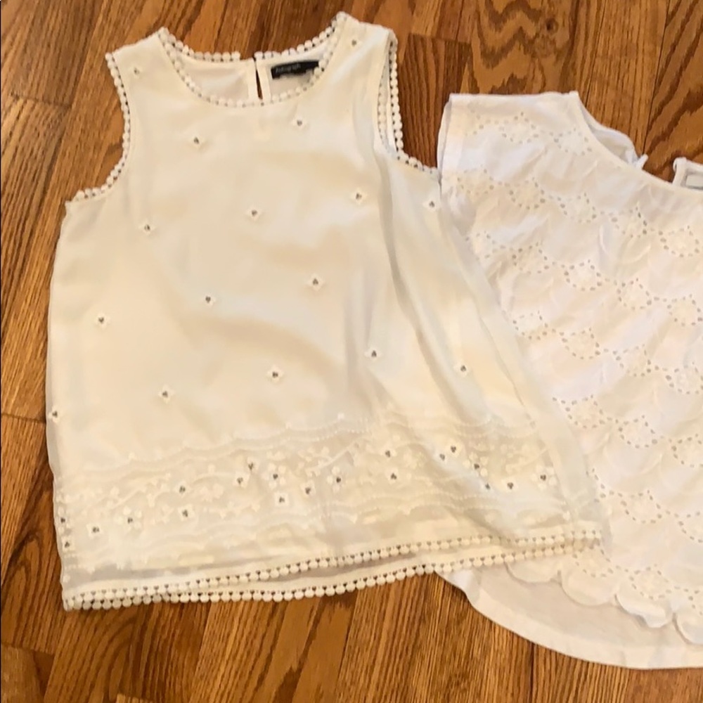 Girls tops in white/cream. Both included. 7-9 yrs